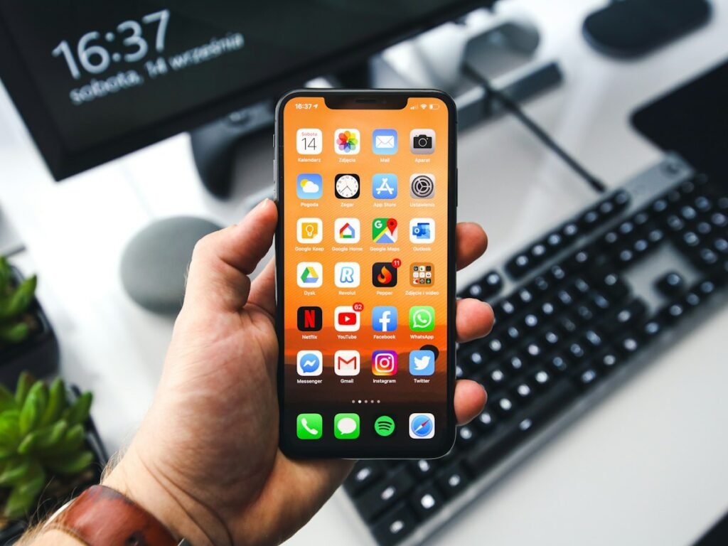 Smartphone on desk illustrating safe iPhone storage cleanup